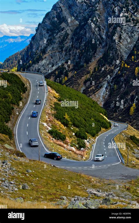 Cars On A Mountain Road In A Hairpin Curve Flüela Pass Davos Stock