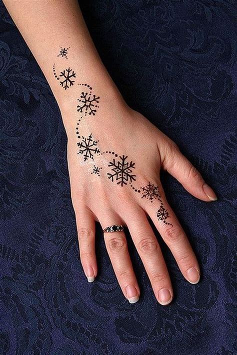 50 Awesome Snowflake Tattoos For Winter Pattern Tattoo Hand Tattoos