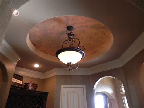 It also has rich hardwood flooring topped with a beige shaggy rug. 10 Elegant Residential Dome Ceiling Designs by CEILTRIM Inc.