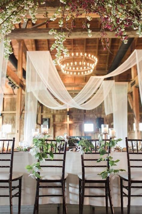 In this economy, couples are smart to figure out ways to have a beautiful wedding while cutting costs, whether in a barn, a park, or their own backyard. Trending-20 Brilliant Wedding Reception Ideas with Draped ...