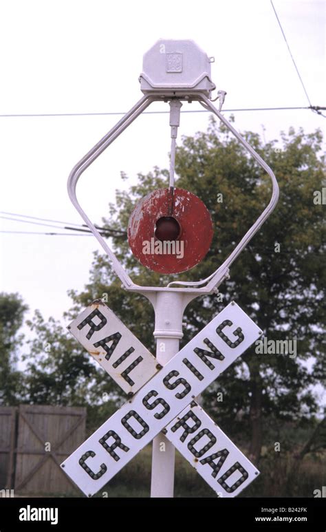 Many Railroad Crossings Are Equipped With Flashing Red Lights Gates