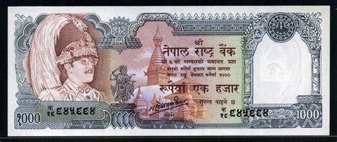 Incomes in the nepal are among the lowest on the world. Nepal currency 1000 Rupees banknote of 1981, King Birendra with Plumed Crown.