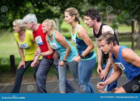 Marathon Athletes On The Starting Line Stock Photo Image Of Happy
