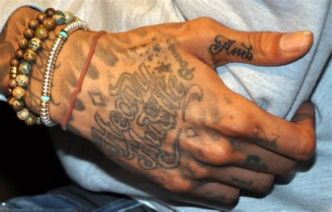 Wiz Khalifas Tattoos Have Taken Over His Entire Body Football
