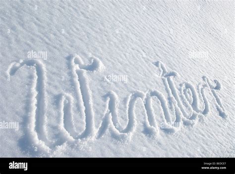 The Word Winter Written On An Untouched Blanket Of Snow Stock Photo Alamy