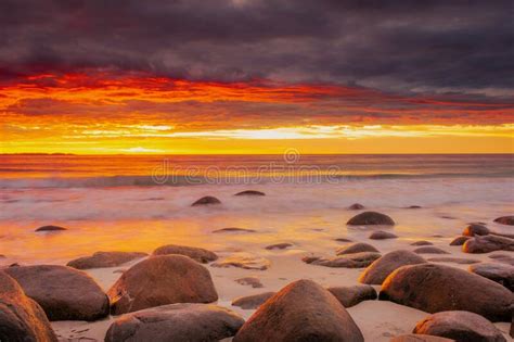 Dramatic Midnight Sunset With Amazing Colors Over Uttakleiv Beach On