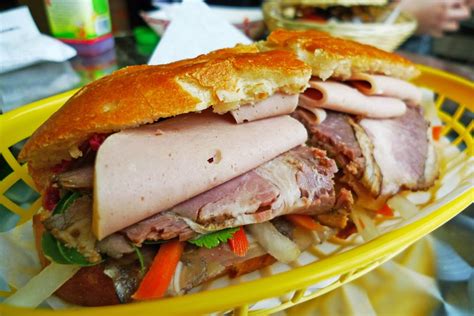 ɓǎjŋ̟ mî, bread) is a short baguette with thin, crisp crust and soft, airy texture. Saigon's Banh Mi | Vietnam Information - Discover the ...