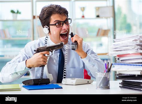 Unhappy angry call center worker frustrated with workload Stock Photo ...