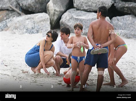 Katie Holmes Tom Cruise And Suri Cruise Relax On The Beach Whilst On