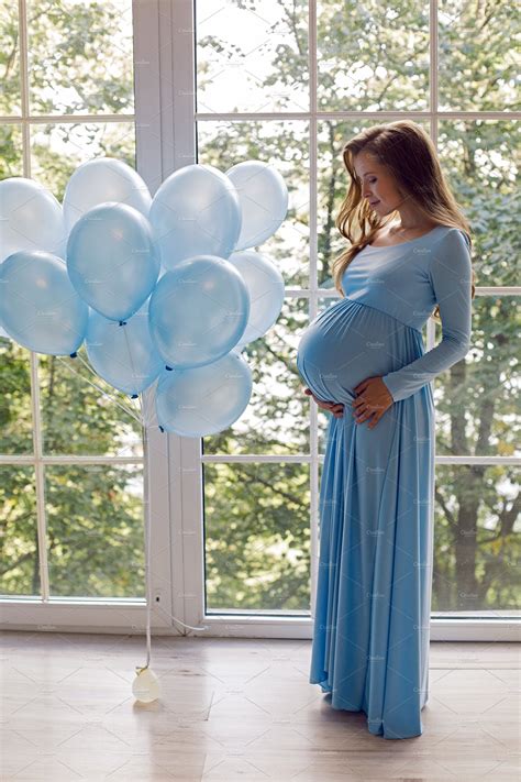 Beautiful Young Pregnant Girl In Blu Featuring Pregnant Belly And