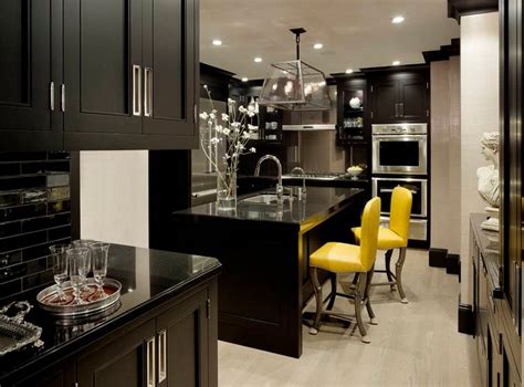 Antique white kitchen cabinets with chocolate glaze. 20 Black Kitchens That Will Change Your Mind About Using ...