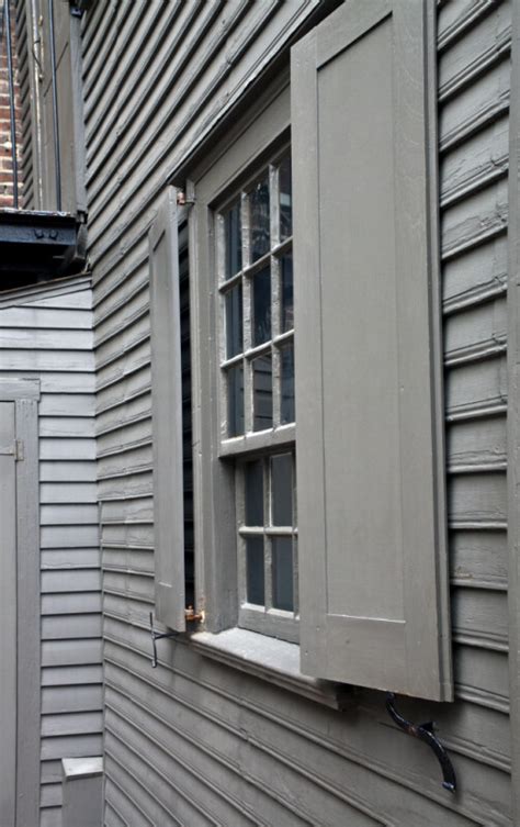 An Oblique View Of A Divided Window With Shutters Clippix Etc