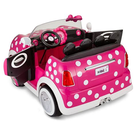 White Polka Dots On A Pink Convertible With A Big Pink Bow On The Side