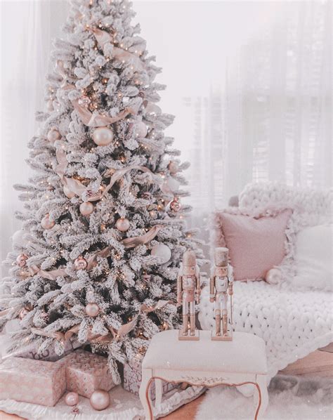I spaced these around the tree and added in some glittery gold ornaments that we had on our tree in previous years. Couture Rose Gold & Blush Christmas Tree Decoration Details - J'adore Lexie Couture
