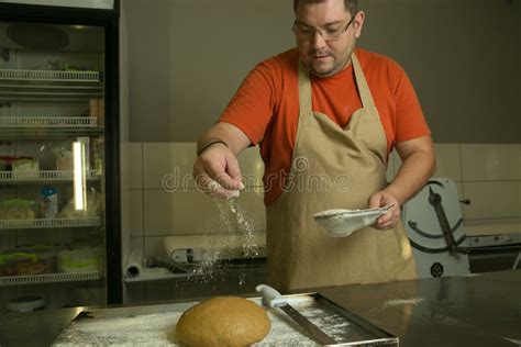 The Process Of Making Bread The Chef Kneads The Dough By Handthe