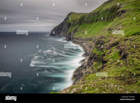 Giant Sea Cliffs Shortly After Storm On Faroe Islands Long Exposure