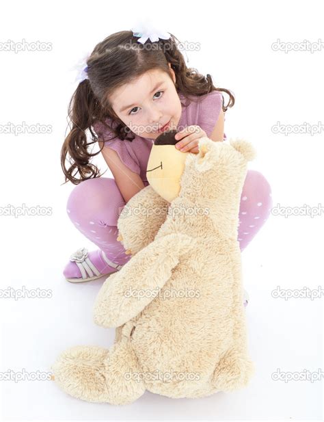 Girl Hugging Her Teddy Bear — Stock Photo © Lotosfoto1 43548483