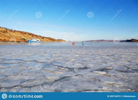 Lake Baikal In December View Of The Frozen Kurkut Bay In The Rays Of
