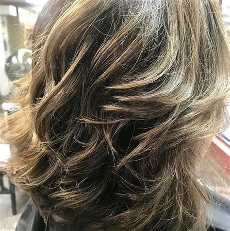 The golden hue catches and reflects light in a mesmerizing pattern, proving that brown hair with blonde highlights can effortlessly elevate any style to the next. 70 Brilliant Brown Hair With Blonde Highlights Ideas