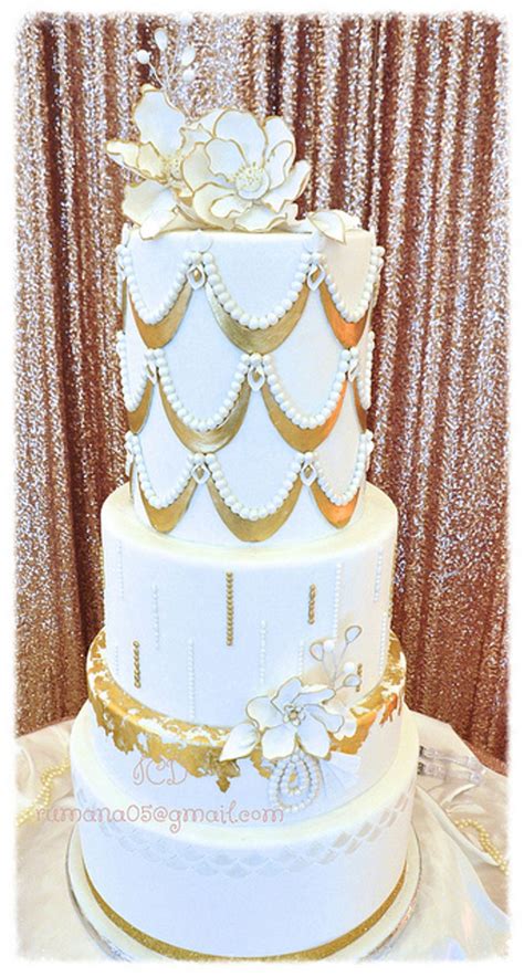 Only the rich could afford white flour and sugar so a white cake was considered a symbol of your wealth. White And Gold Wedding Cake - CakeCentral.com