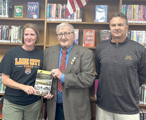 Peters Donates His Camp Lakeview Book To High Babe Media Center Lake City Graphic