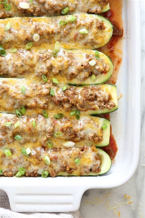 This has become a favorite in my house! Taco Stuffed Zucchini Boat Recipe | Skinnytaste