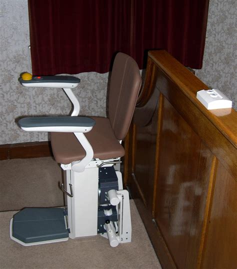 The stair lift consists of a chair and rail running along the length of the staircase. Stair lifts | stair lifts