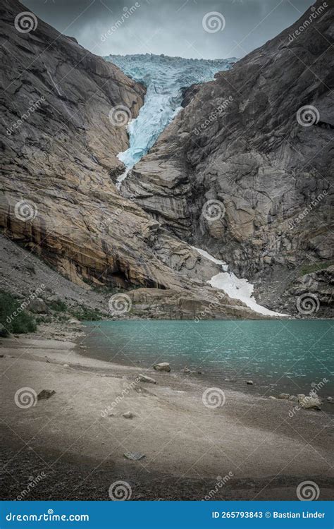Briksdalsbreen Glacier Ice And Glacier Lake In The Mountains Of