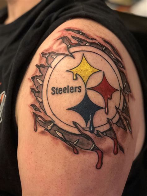 Pittsburgh tattoo & piercing is committed to providing an accessible website. Pittsburgh Steelers shoulder skin rip tattoo (With images ...