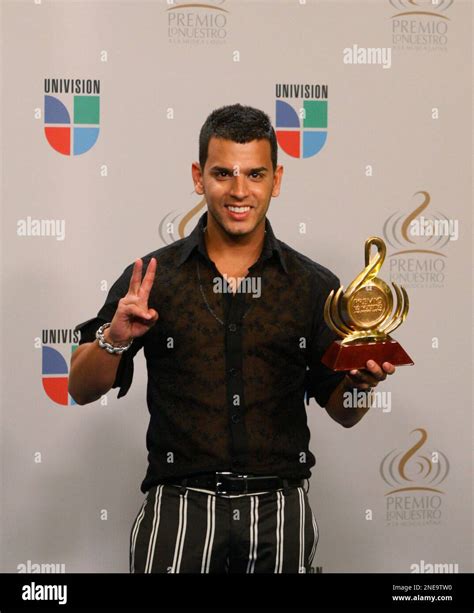 puerto rican reggaeton singer tito el bambino poses backstage at the premio lo nuestro latin