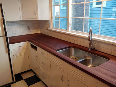 For those of you with butcher block countertops, this project is quick, easy and would be perfect to tackle when you start feeling stir crazy. Butcher Block & Tile Backsplash Installation - Nau ...