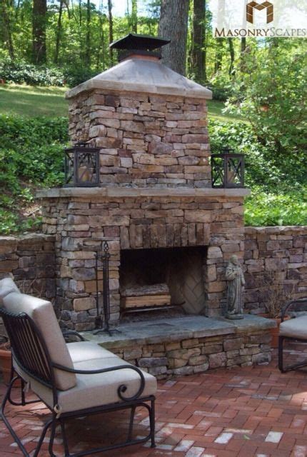 Brick Paver Patio With A Custom Built Natural Stone Fireplace And A