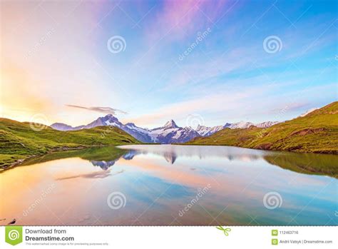 Fantastic Landscape At Sunrise Over The Lake In The Swiss Alps Stock