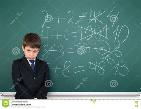 Free for commercial use no attribution required high quality images. School Boy Decides Examples Math Wrong On Chalkboard ...