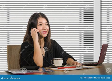 Young Beautiful And Successful Asian Chinese Business Woman Working