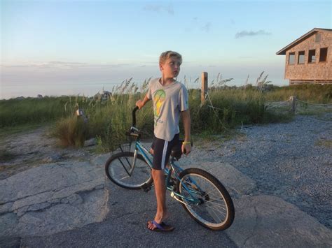 Julian On His Bike Near Pamlico Sound Roxanne Slimak Ocracoke