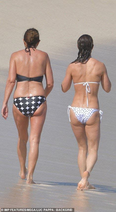 Like Mother Like Daughter Pippa Showed Off Her Toned Figure As She Strolled Along The Sandy
