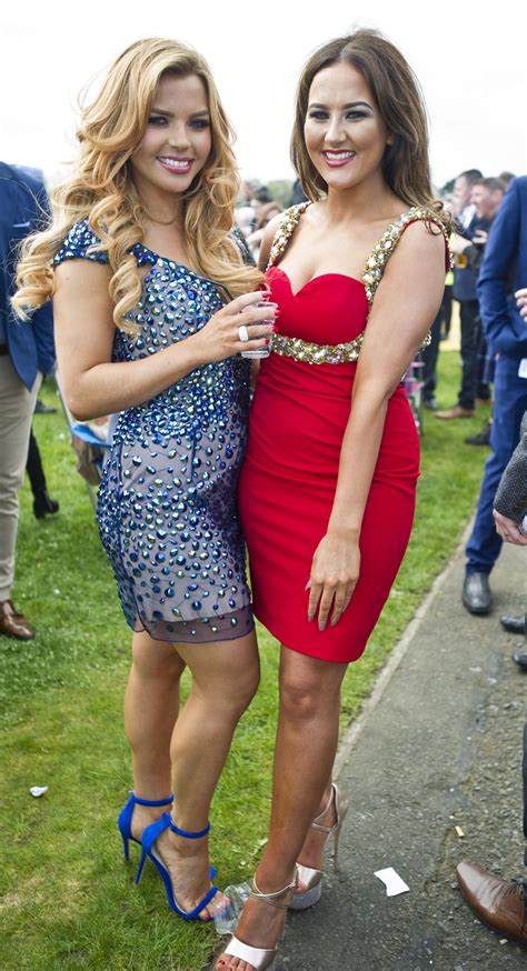 Plunging Dresses And Bare Legs On Display For Ladies Day At The Scottish Grand National The