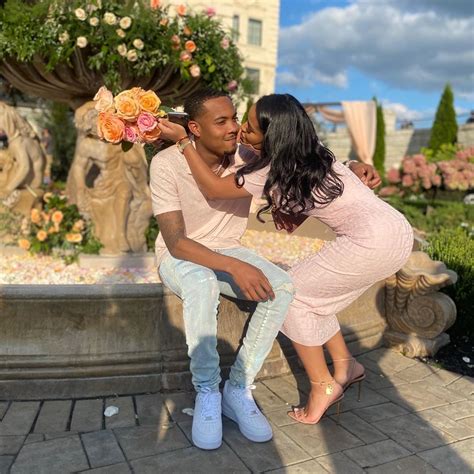 taina williams posed with beau g herbo in 1 690 pink fendi logo dress and tom ford padlock