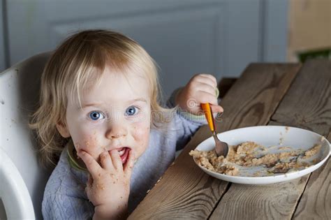 Baby Eats Porridge Spoon Mashed Stock Image Image Of Breakfast Dirty
