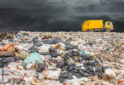 Garbage Dump Pile In Trash Dump Or Landfilltruck Is Dumping The Gabage