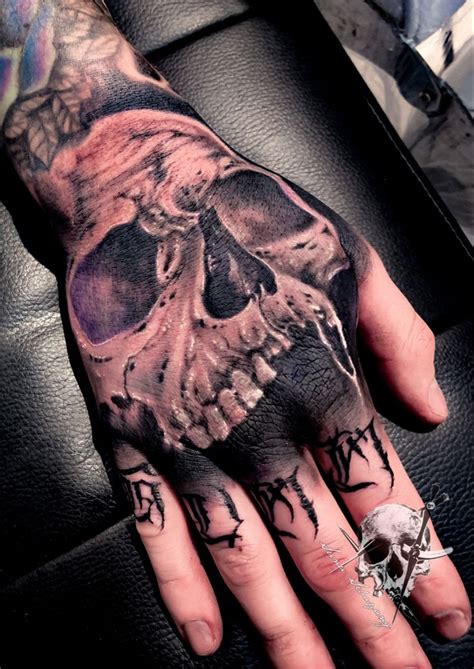 Skull Hand Tattoo Realism Hand Tattoos Hand Tattoos For Guys Skull Hand Tattoo