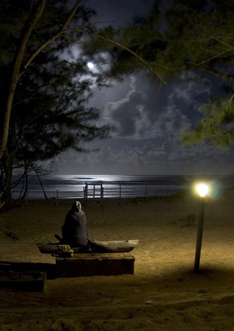 Man Sitting Watching The Full Moon At The Beach Photograph By Dray Van