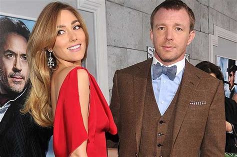 Guy Ritchie Looks Almost As Dapper As Girlfriend Jacqui Ainsley Thanks To Robert Downey Jr At