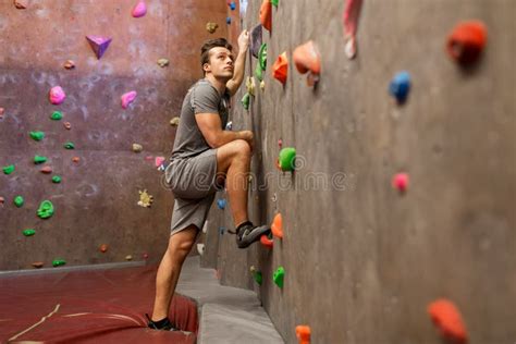 Young Man Exercising At Indoor Climbing Gym Stock Photo Image Of