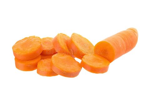 Fresh Carrots With Slices Of Carrot On The White Background Stock Photo