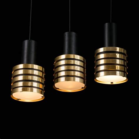 1950s Paavo Tynell K2 49 Brass And Glass Pendants For Taito Oy At 1stdibs