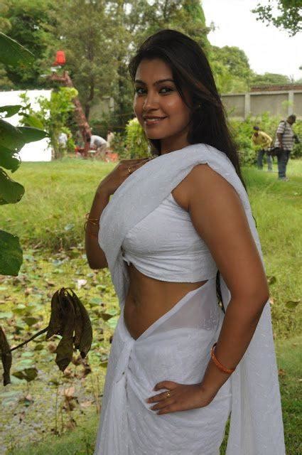 Varsha Spicy Pose Photo Shoot In Saree Tamil Actress Varsha K Pandey