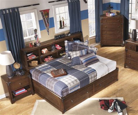 Teens, especially boys are so active not only outside the house but even in their own room. Delburne Full Size Storage Bed | B362 Ashley Kids ...