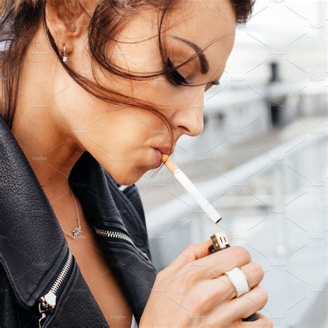 Portrait Of Young Woman Smoking Cigarette Stock Photos ~ Creative Market